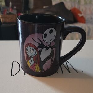 Black Ceramic Mug with Pink Accent and Character Artwork